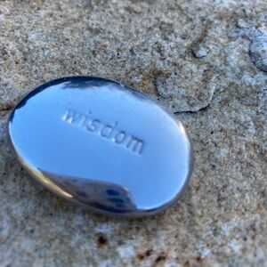 Metal worry stone.  Wisdom